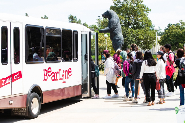 Students getting into the bus shuttle